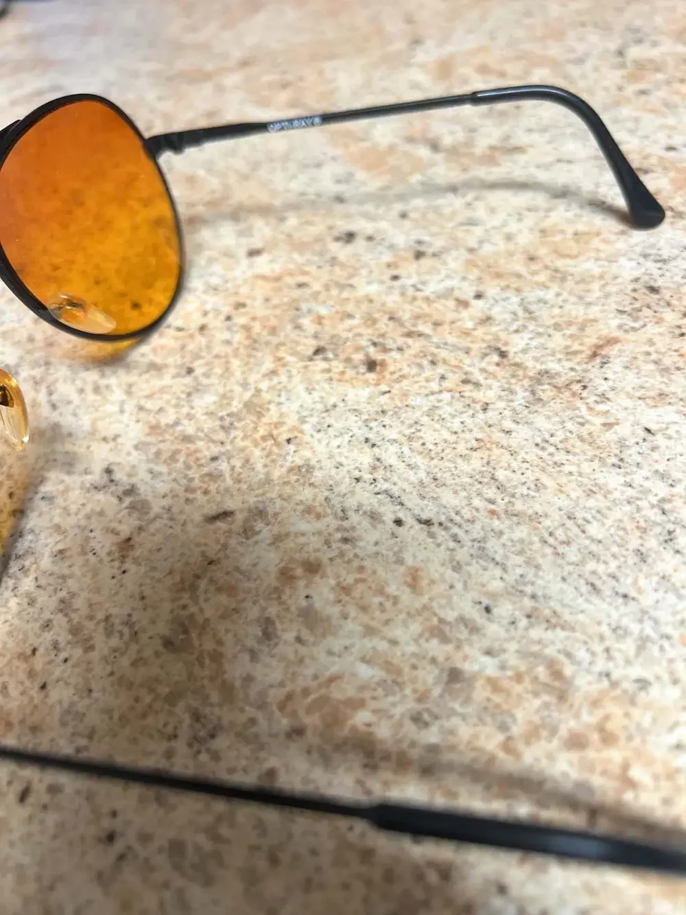 Optirays Aviator Sunglasses with Orange Lenses and Brown Leather Case